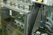トップシール付き盛込機